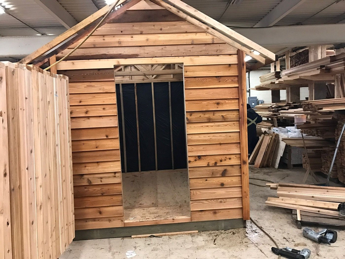 Cedar utility shed with cedar siding